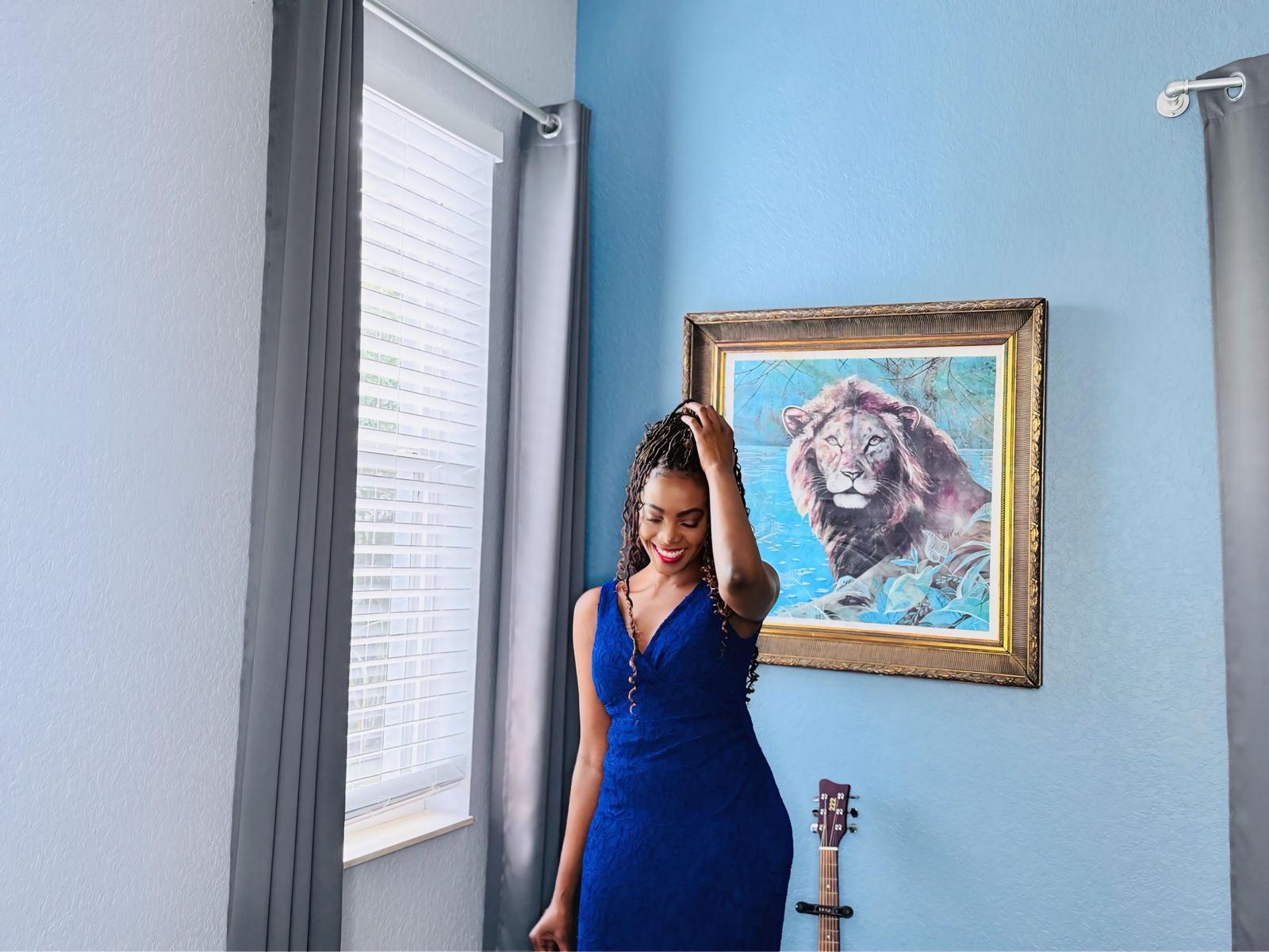 "Olanie J. smiling joyfully, celebrating her birthday, surrounded by love and gratitude; a heartfelt thank you to everyone who sent birthday wishes."